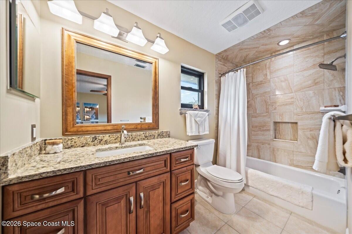 3071 Rio Palma North Indialantic, FL 32903 - Photo 27 of 49 027_Bedroom Shared Bath