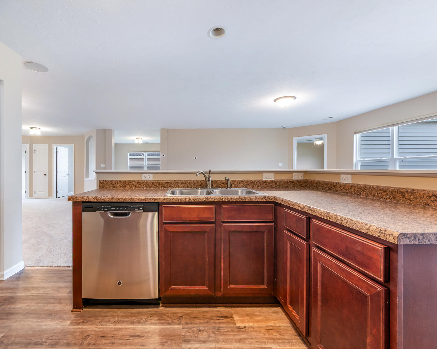 515 East 117th Place Crown Point, IN 46307 - Photo 25 of 35 a kitchen with stainless steel appliances granite countertop a sink and a stove