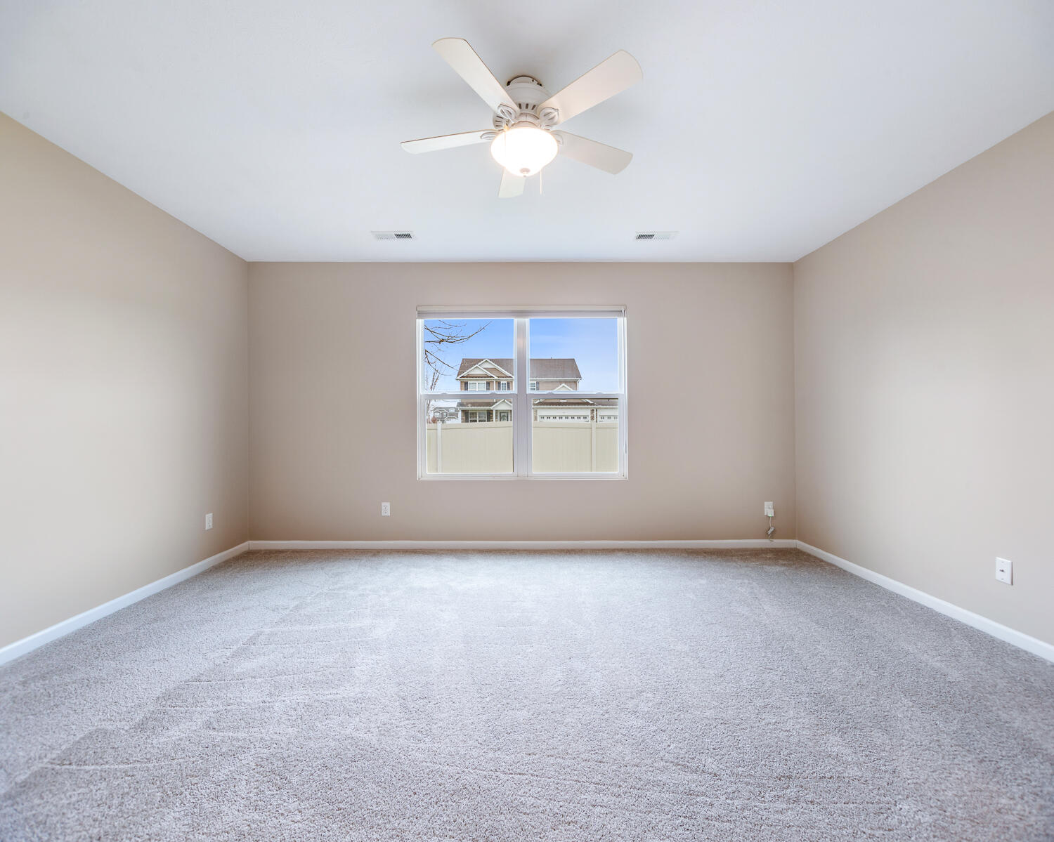 515 East 117th Place Crown Point, IN 46307 - Photo 30 of 35 an empty room with windows and ceiling fan