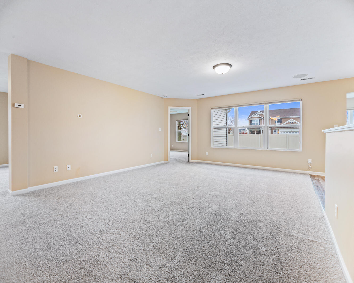 515 East 117th Place Crown Point, IN 46307 - Photo 10 of 35 a view of an empty room with a window