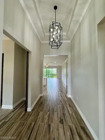 a view of gallery with wooden floor