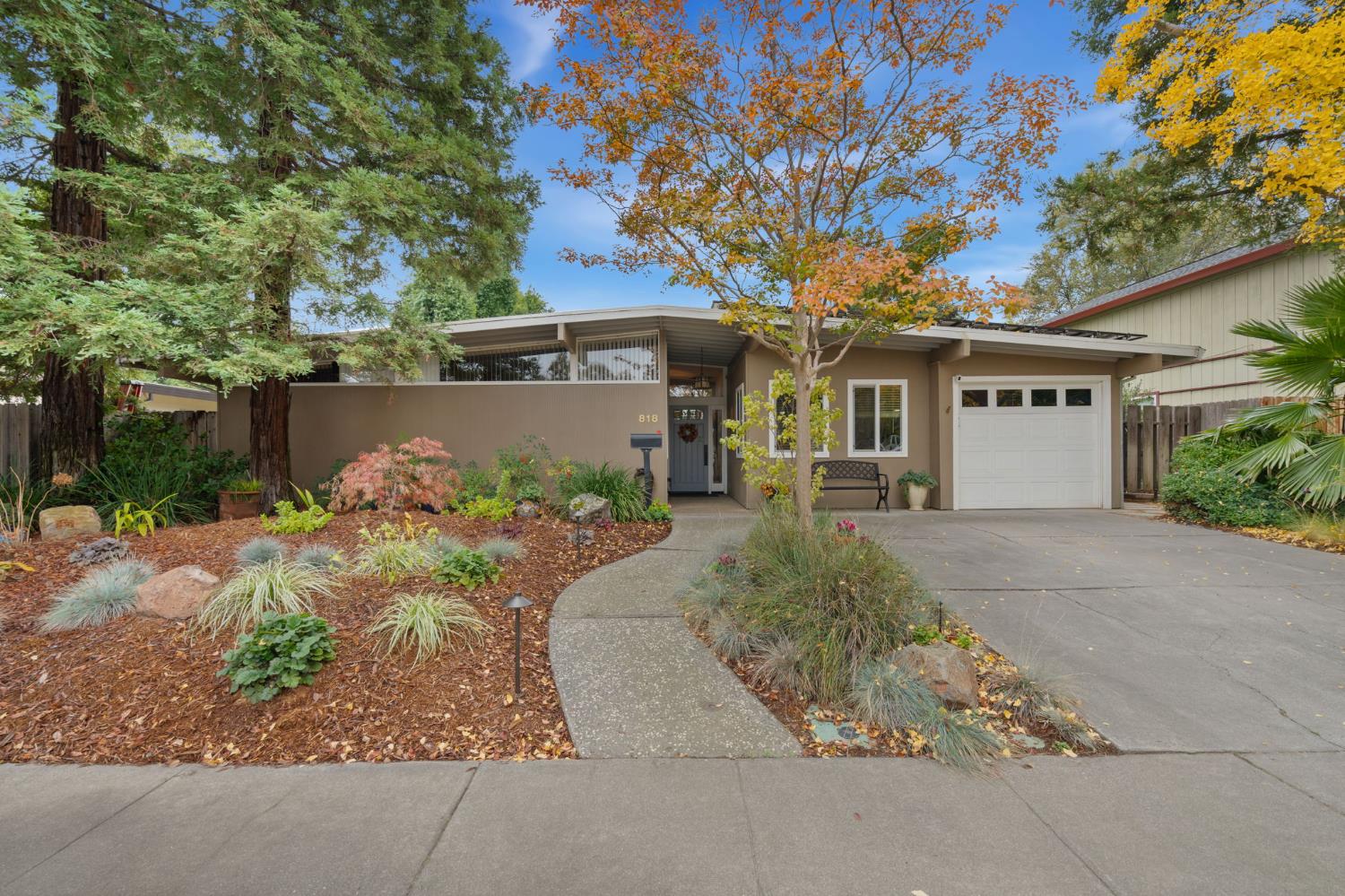 front view of a house with a yard