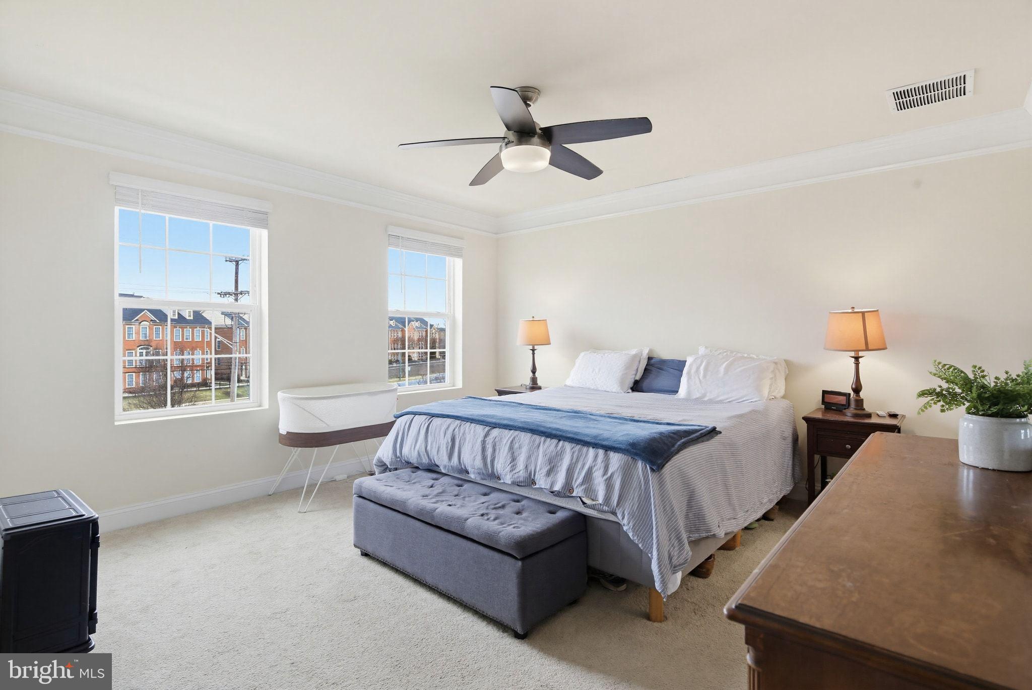 5057 East Joppa Road Perry Hall, MD 21128 - Photo 11 of 29 a spacious bedroom with a bed and window