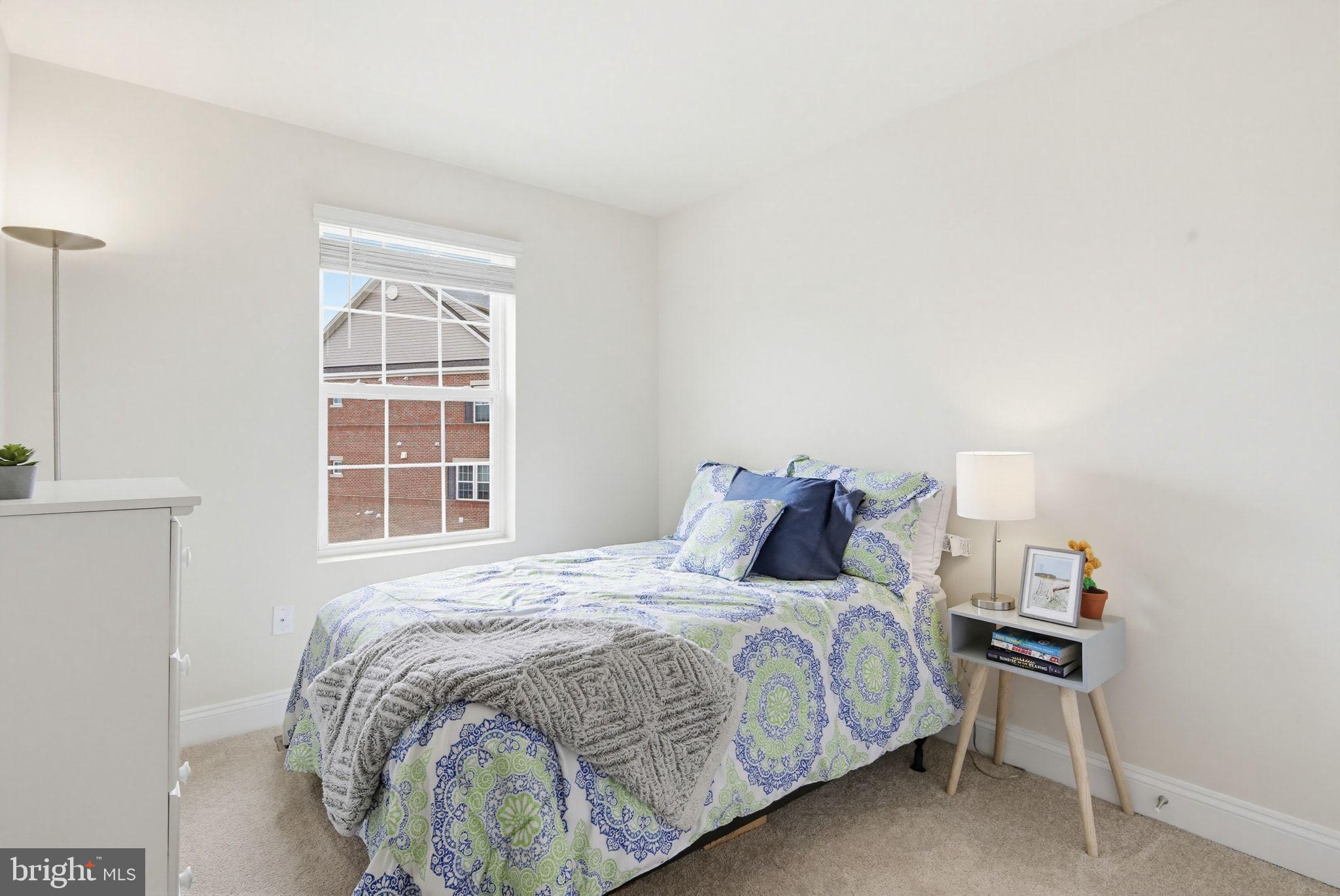 5057 East Joppa Road Perry Hall, MD 21128 - Photo 16 of 29 a bedroom with a bed and a window