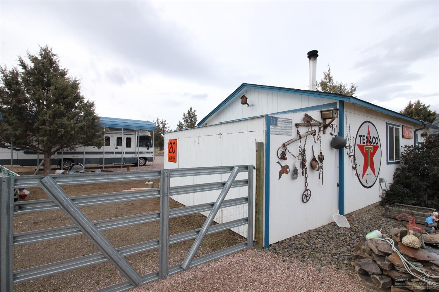 67006 Central Street Bend, OR 97703 - Photo 9 of 22 12ft gate to rear fenced yard area. RV
