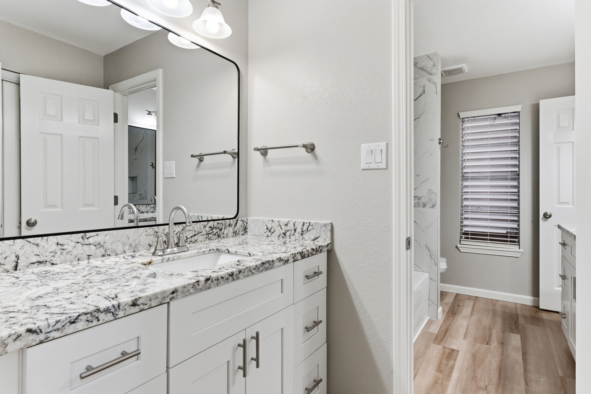 1620 Beachcomber Lane Houston, TX 77062 - Photo 16 of 27 a bathroom with a sink and a mirror