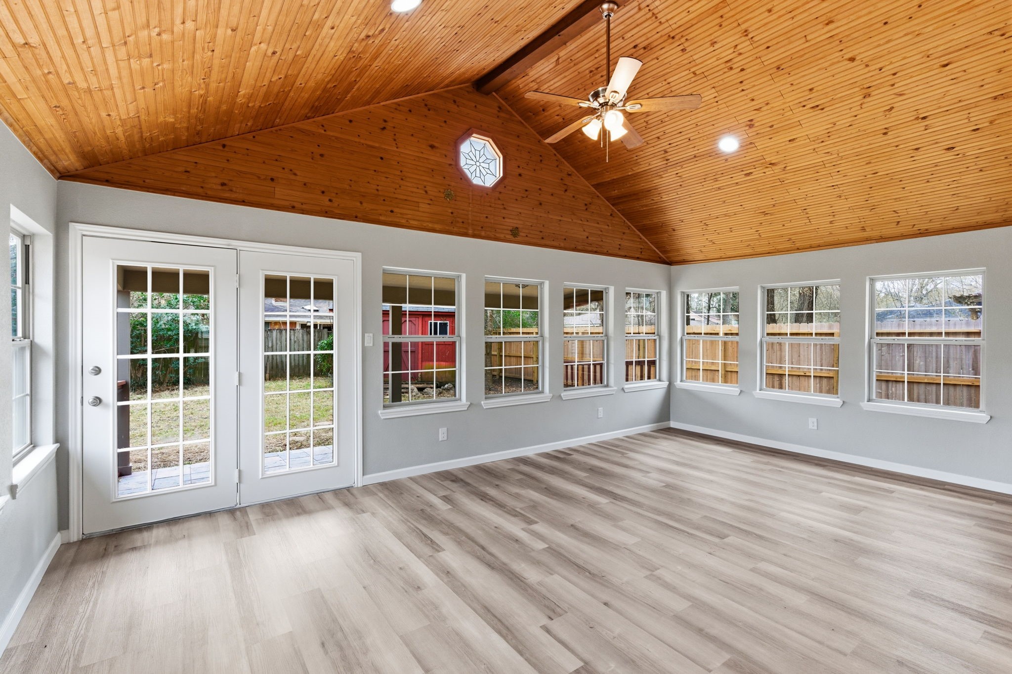 1620 Beachcomber Lane Houston, TX 77062 - Photo 19 of 27 a view of an empty room with a window and wooden floor