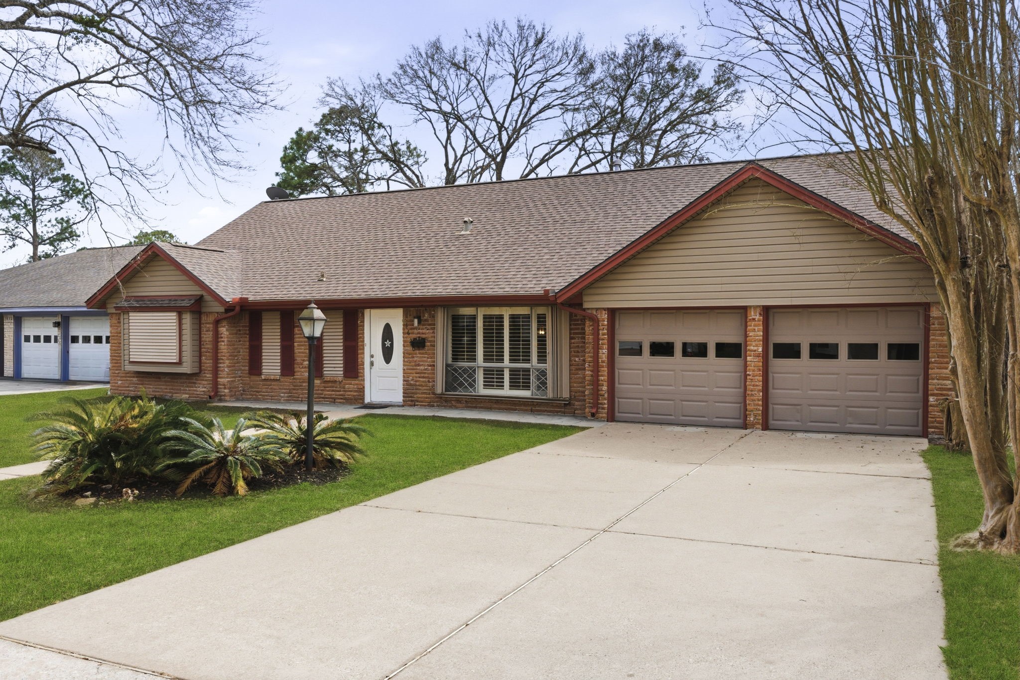 1620 Beachcomber Lane Houston, TX 77062 - Photo 2 of 27 a front view of a house with garden