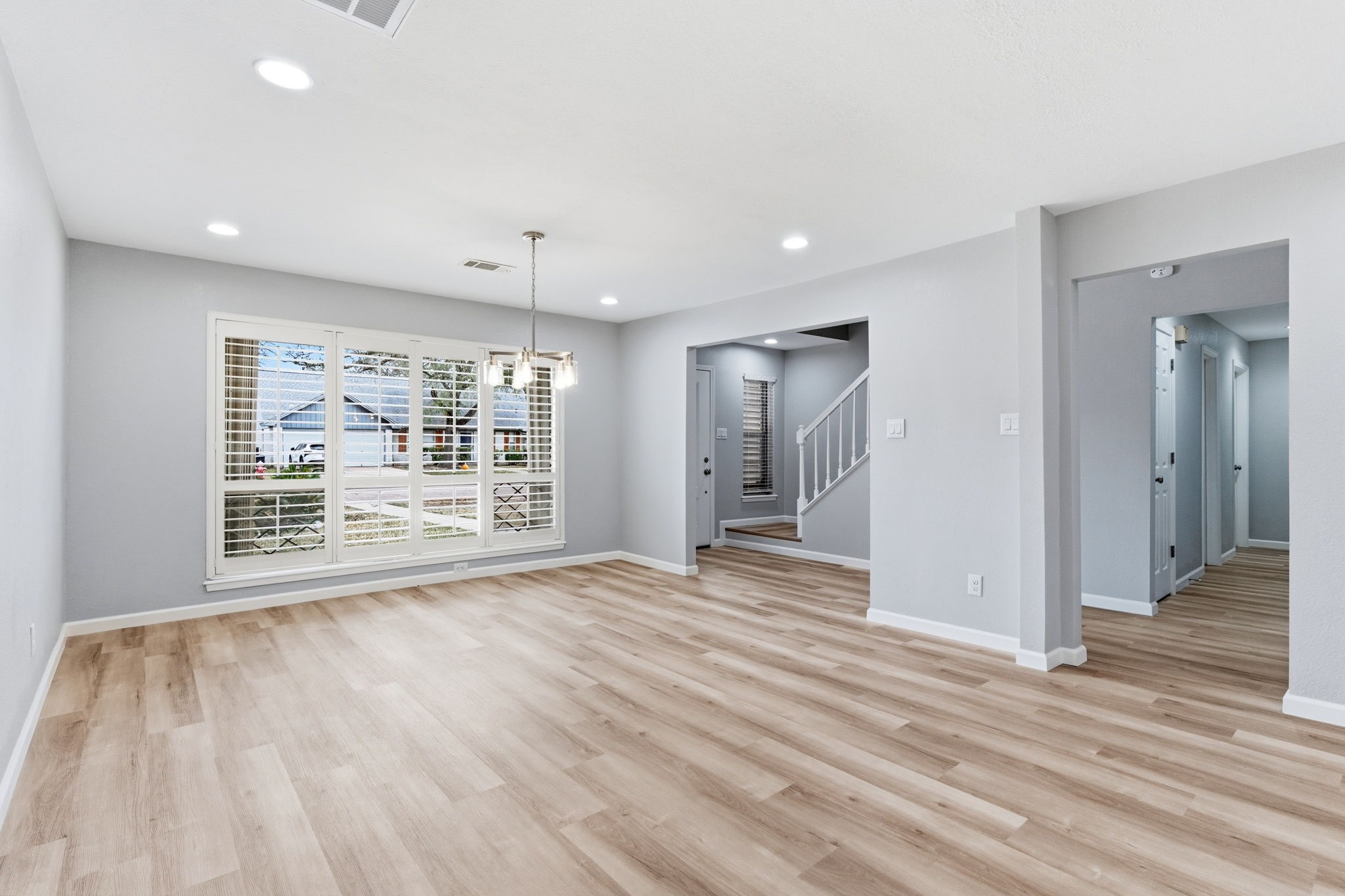 1620 Beachcomber Lane Houston, TX 77062 - Photo 23 of 27 a view of an empty room with wooden floor and a window
