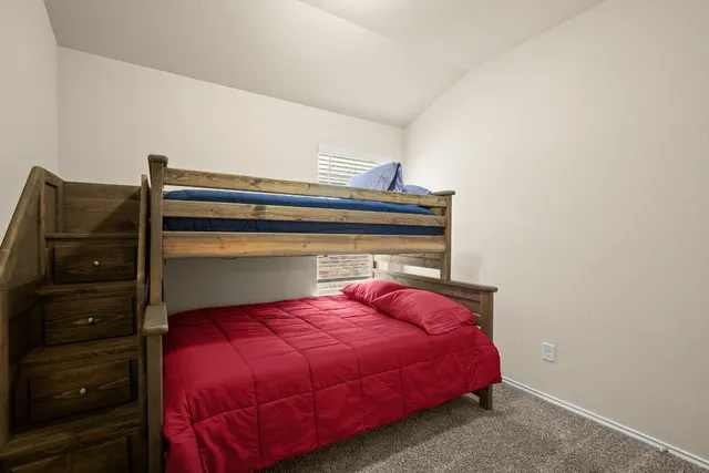 a bathroom with a bathtub and a sink