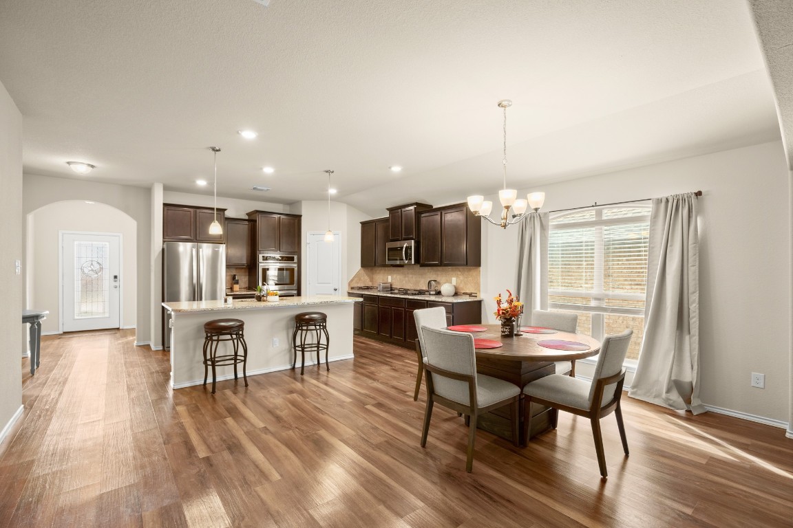 5526 Perdita Drive Belton, TX 76513 - Photo 5 of 23 a view of a dining room with furniture window and wooden floor