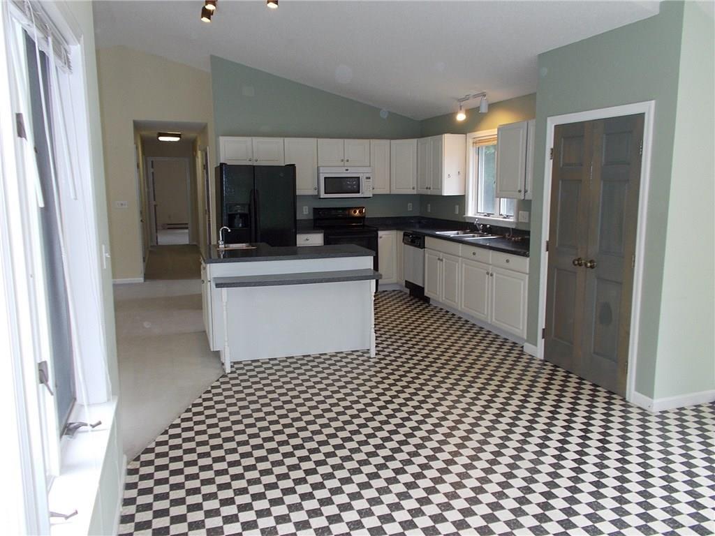 21 River Road Topsham, ME 04086 - Photo 2 of 13 View of kitchen from dining area