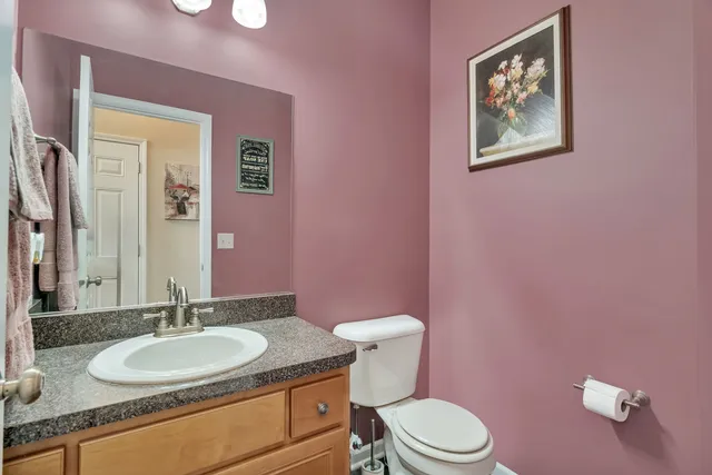 a room with lots of furniture and a flat screen tv