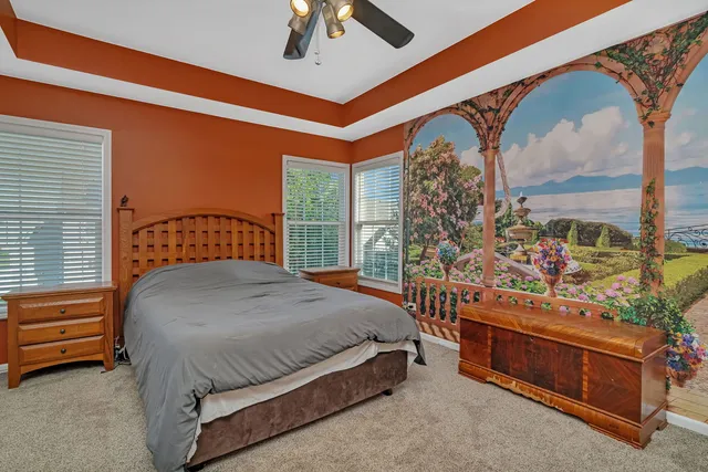 a bedroom with a bed and furniture