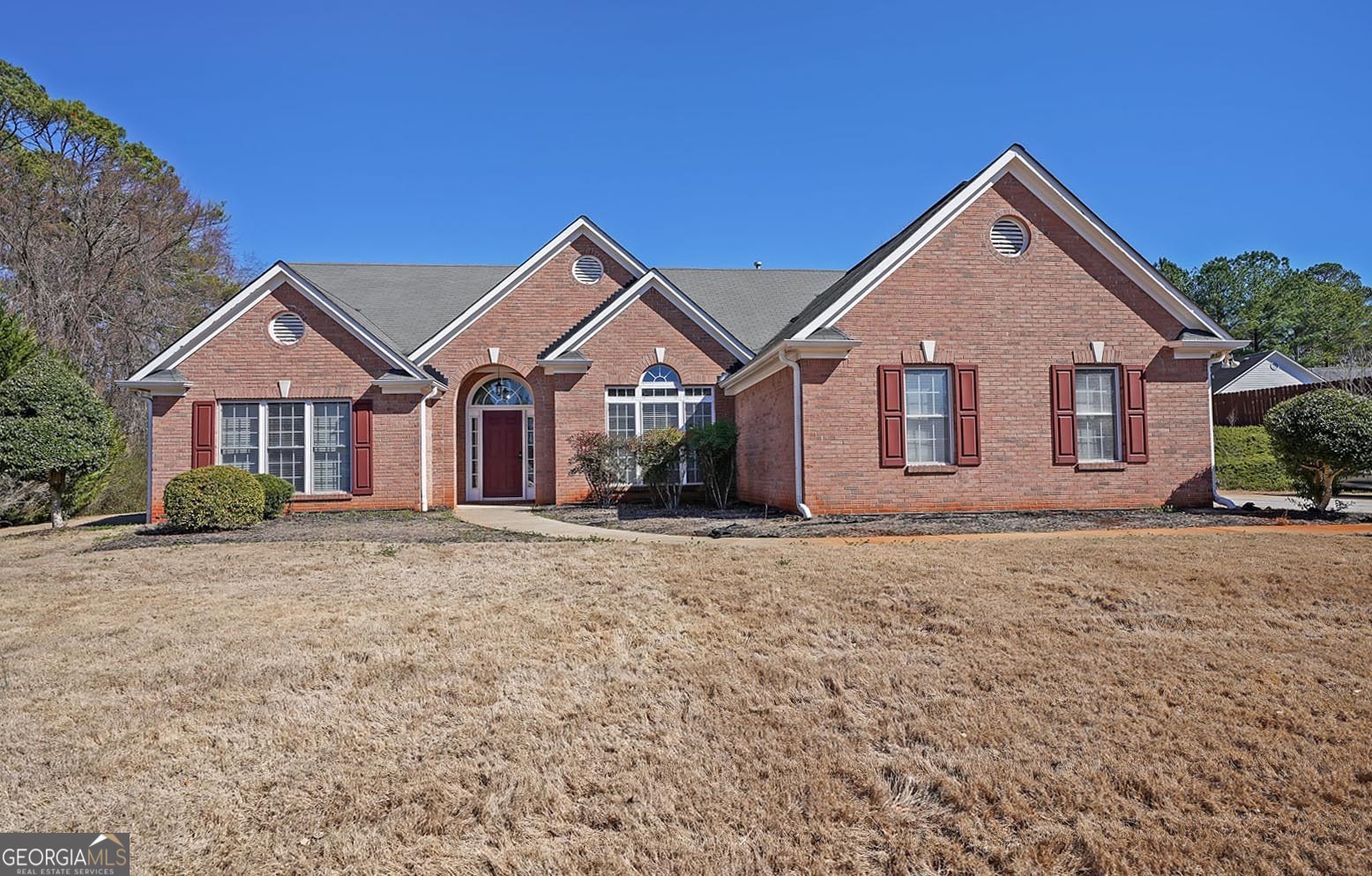 front view of a house and a yard