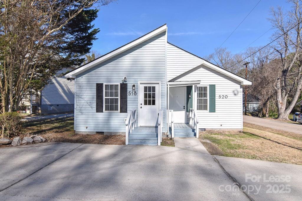 520 Denver Street Kannapolis, NC 28083 - Photo 14 of 14 a view of a house with a patio