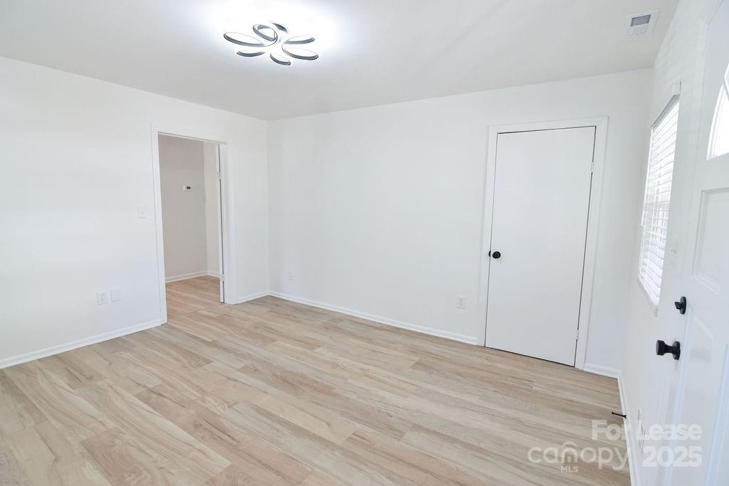 520 Denver Street Kannapolis, NC 28083 - Photo 4 of 14 a view of an empty room with a window