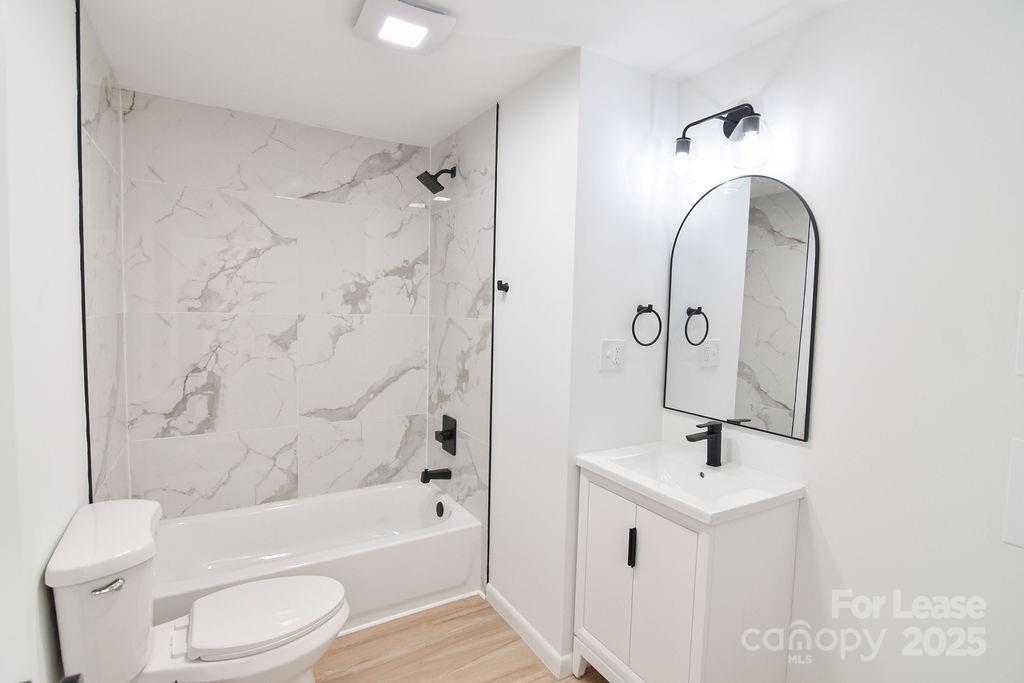 520 Denver Street Kannapolis, NC 28083 - Photo 10 of 14 a bathroom with a sink toilet and shower