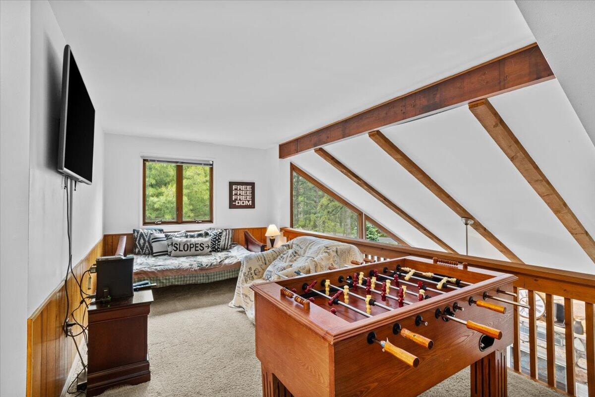 52 Hickory Road Lake Harmony, PA 18624 - Photo 14 of 36 a living room with furniture and a flat screen tv
