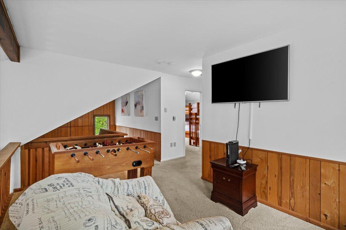 52 Hickory Road Lake Harmony, PA 18624 - Photo 15 of 36 a living room with furniture and a flat screen tv