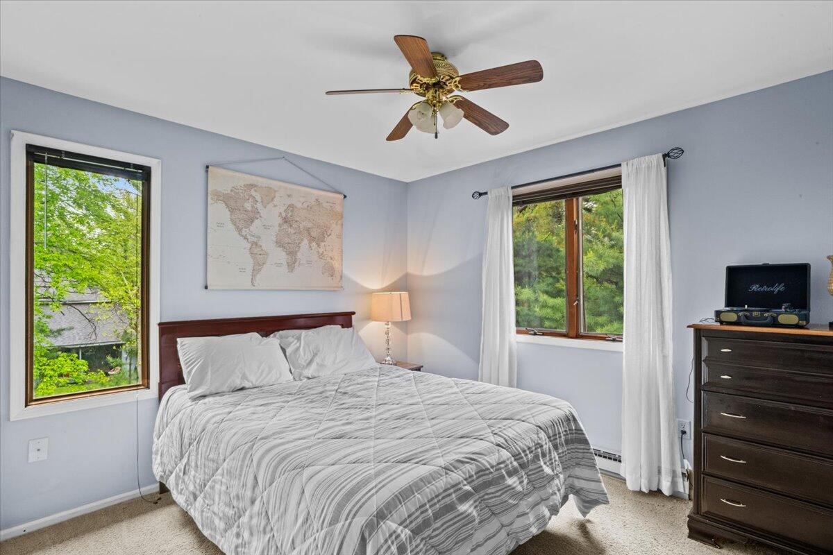 52 Hickory Road Lake Harmony, PA 18624 - Photo 20 of 36 a bedroom with a bed and a tv