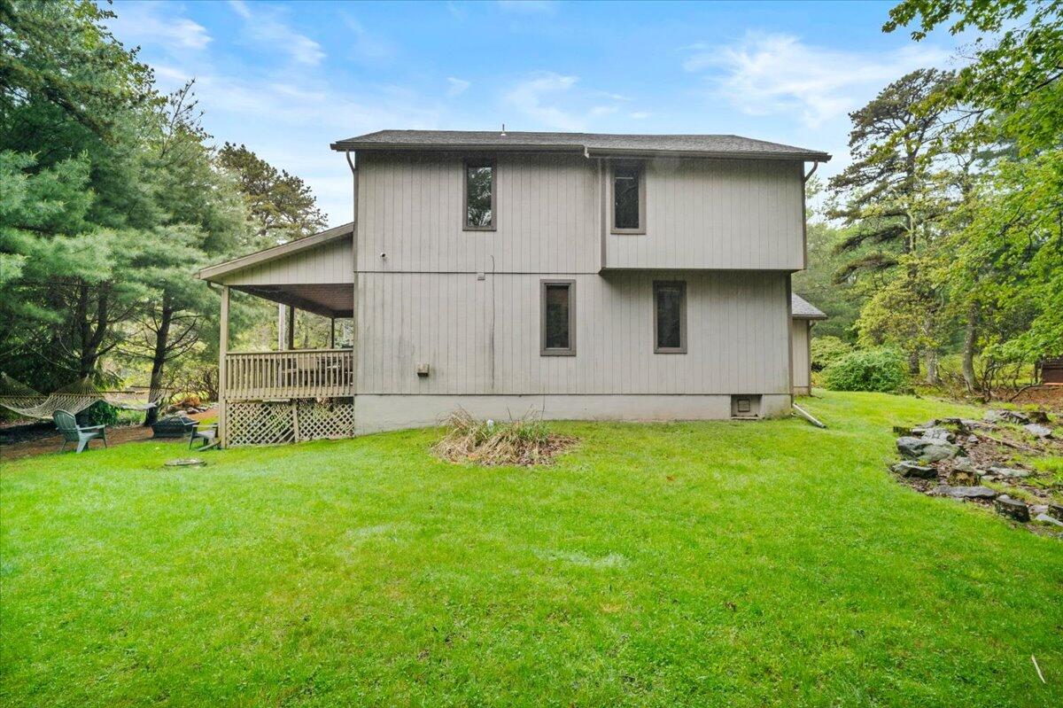 52 Hickory Road Lake Harmony, PA 18624 - Photo 26 of 36 a house with garden in front of it