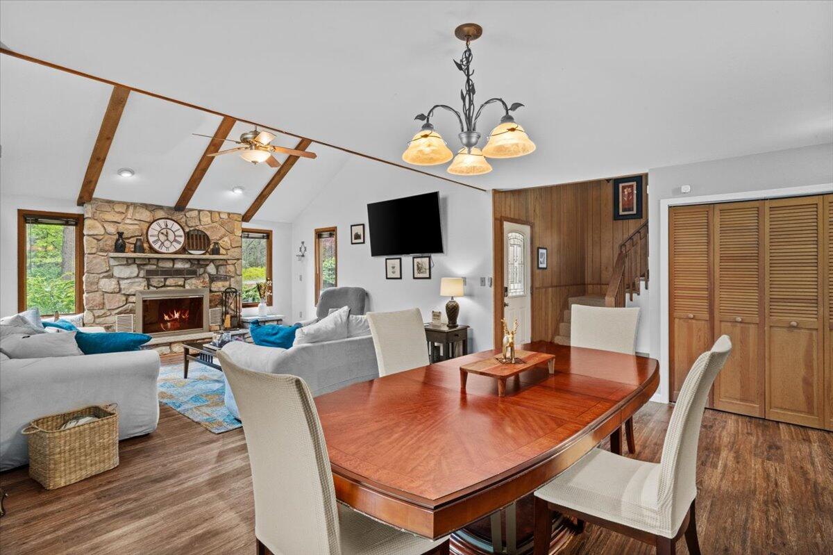 52 Hickory Road Lake Harmony, PA 18624 - Photo 9 of 36 a view of a dining room with furniture window and wooden floor