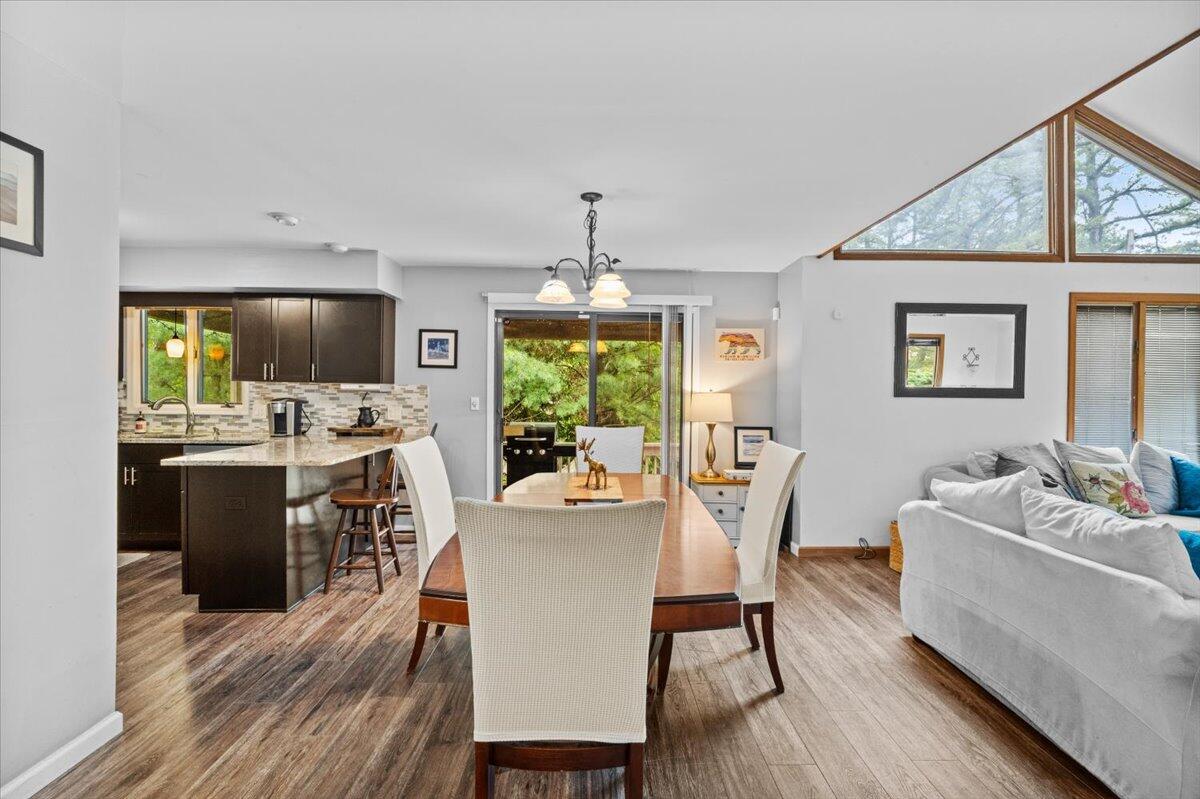 52 Hickory Road Lake Harmony, PA 18624 - Photo 10 of 36 a view of a dining room with furniture window and wooden floor