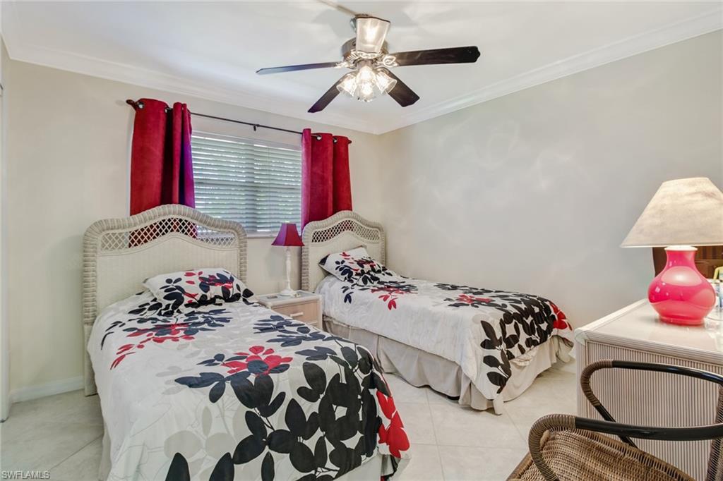 49 High Point Circle South, Unit 102 Naples, FL 34103 - Photo 14 of 42 Guest bedroom