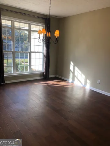 a view of a livingroom with a window