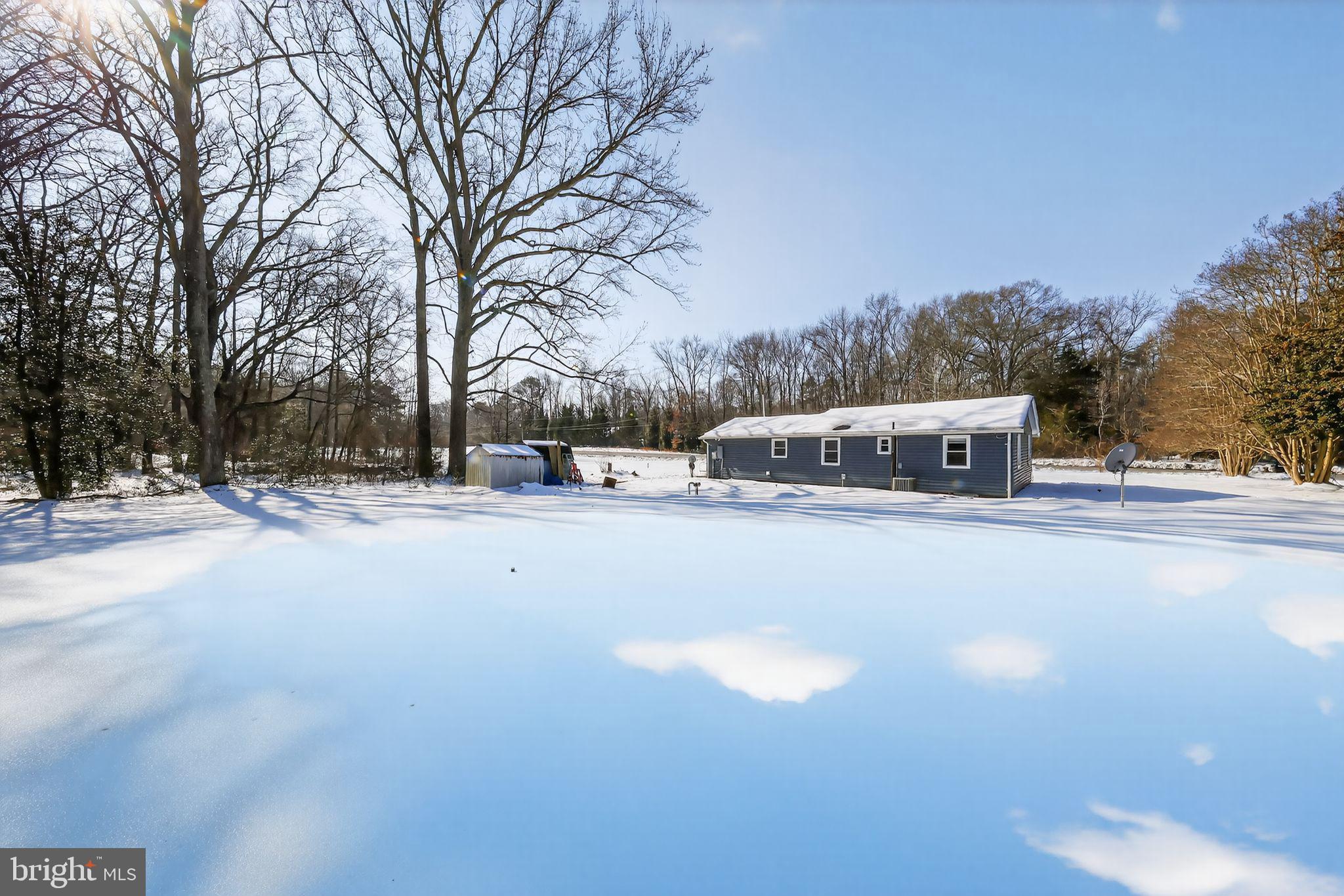 14857 Oakland Road Ridgely, MD 21660 - Photo 2 of 14 a view of road with a building