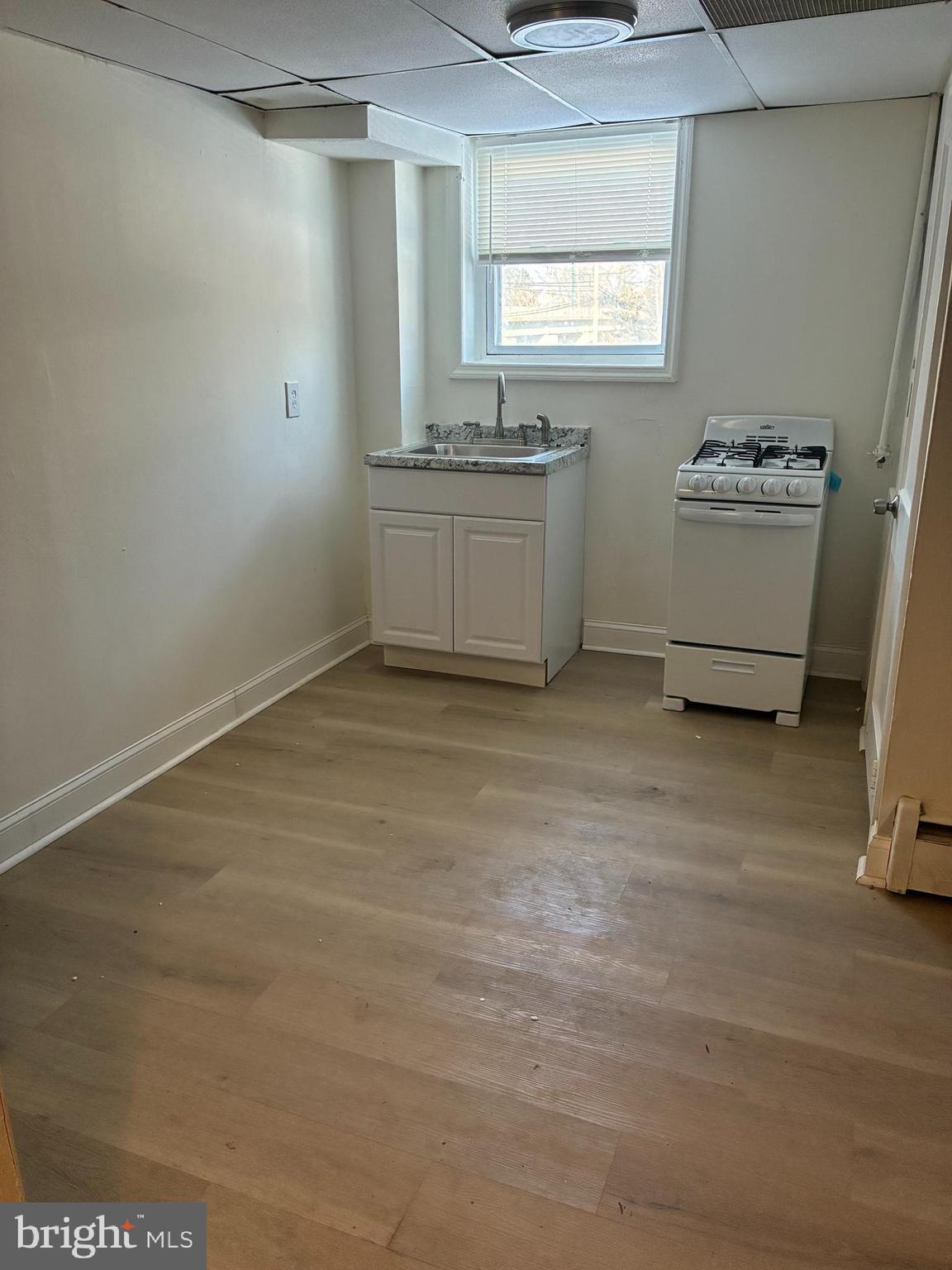 1800 Garrett Road, Unit B3 Lansdowne, PA 19050 - Photo 3 of 6 a room with a window and a dresser