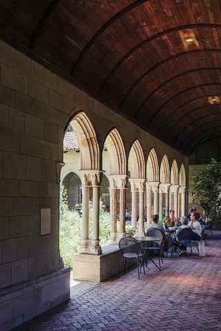 a view of a bench in a garden