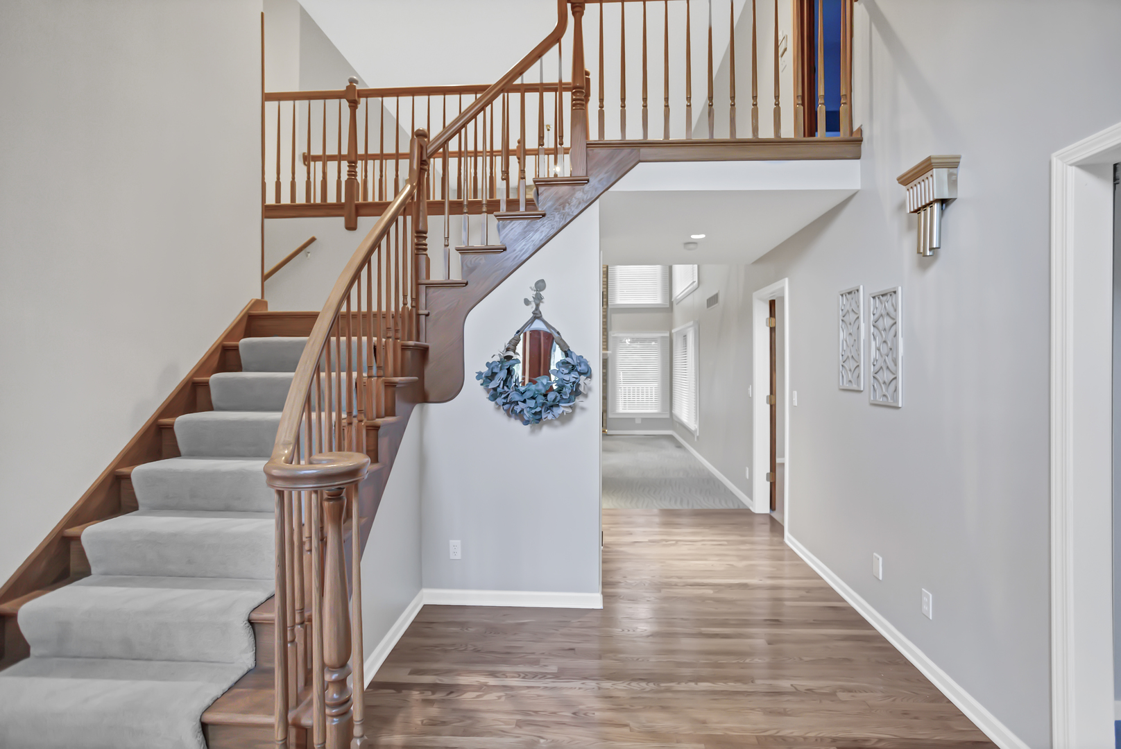 3 Hampton Court DeKalb, IL 60115 - Photo 2 of 35 a view of entryway and hall with wooden floor