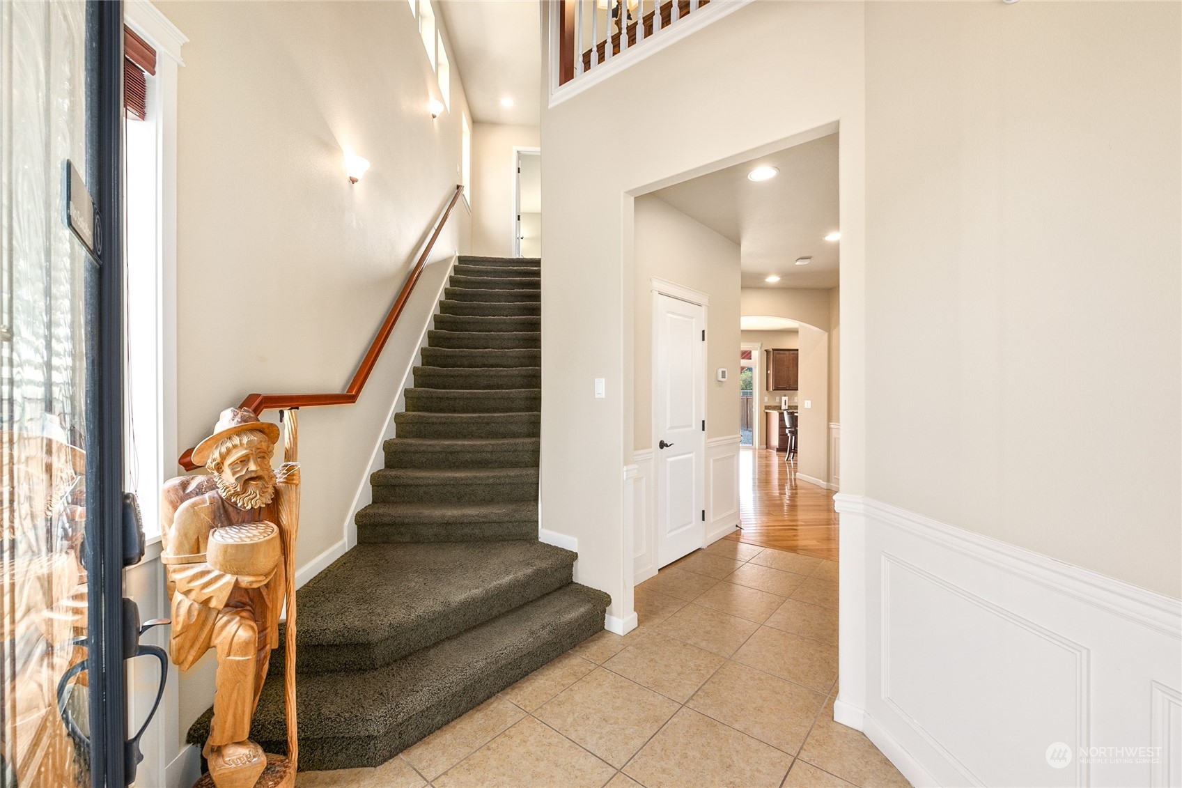 1910 Talbot Road South Renton, WA 98055 - Photo 3 of 26 a view of entryway and hall with wooden floor