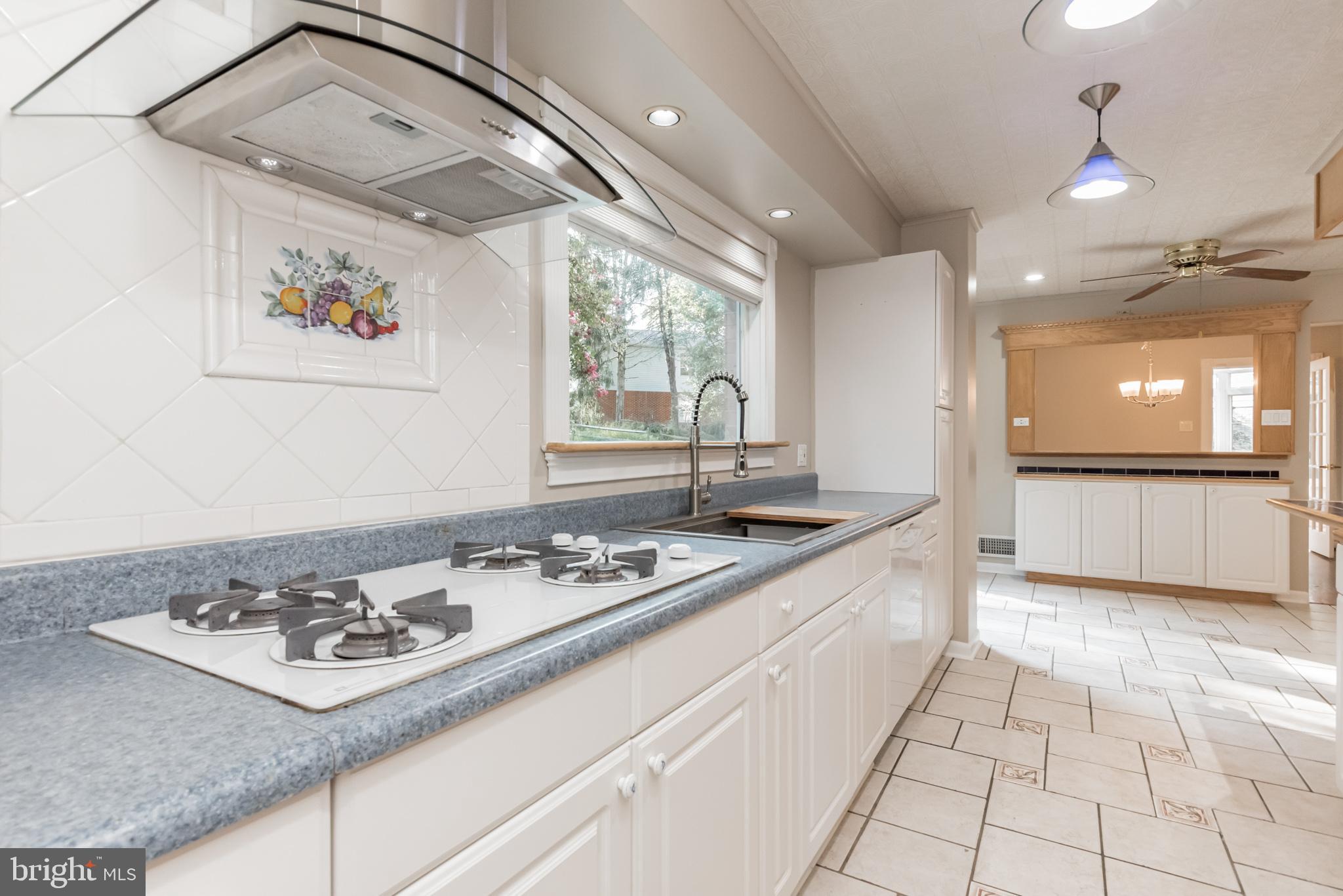 2124 Drury Road Silver Spring, MD 20906 - Photo 3 of 29 Gas cooktop and contemporary hood