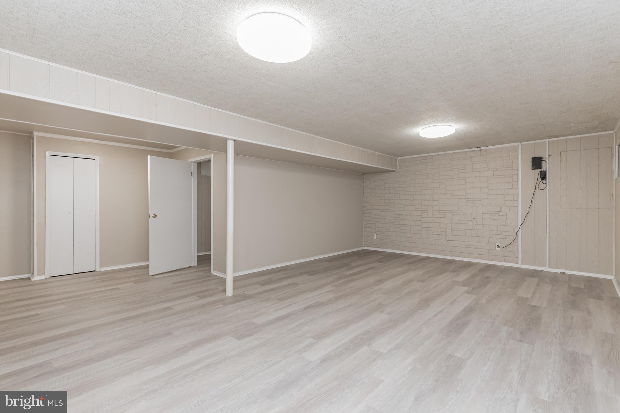 2124 Drury Road Silver Spring, MD 20906 - Photo 25 of 29 Recreation room showing door to office #2