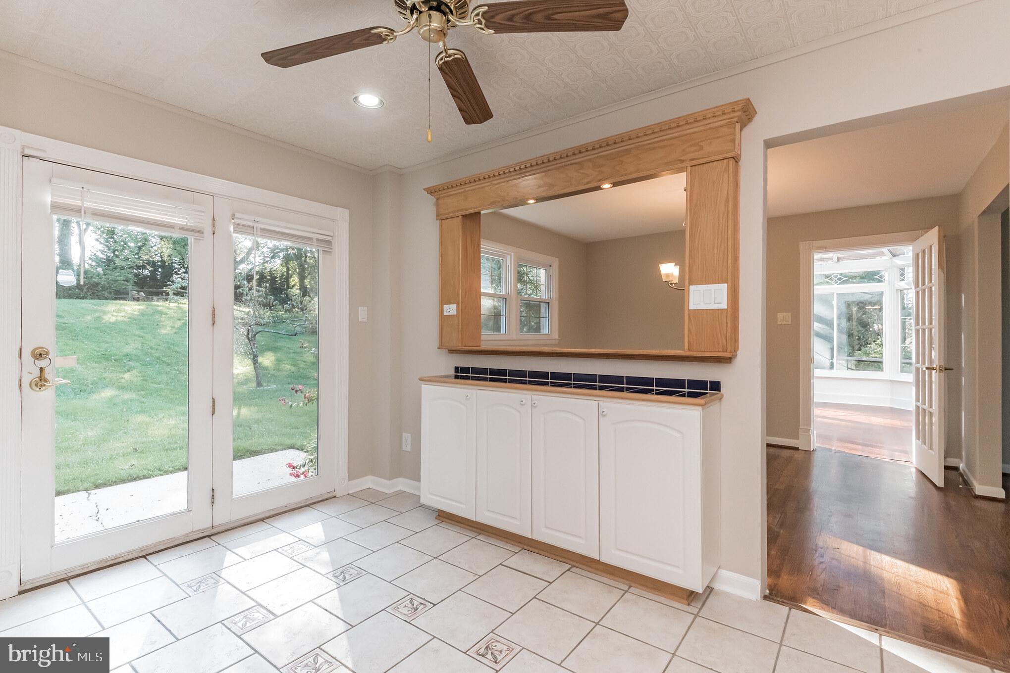 2124 Drury Road Silver Spring, MD 20906 - Photo 5 of 29 Kitchen table space exits to patio and backyard