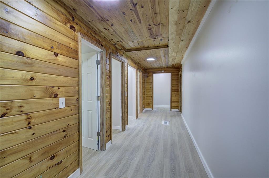 76 Morning Dew Lane Clayton, GA 30525 - Photo 17 of 28 a view of hallway with wooden floor
