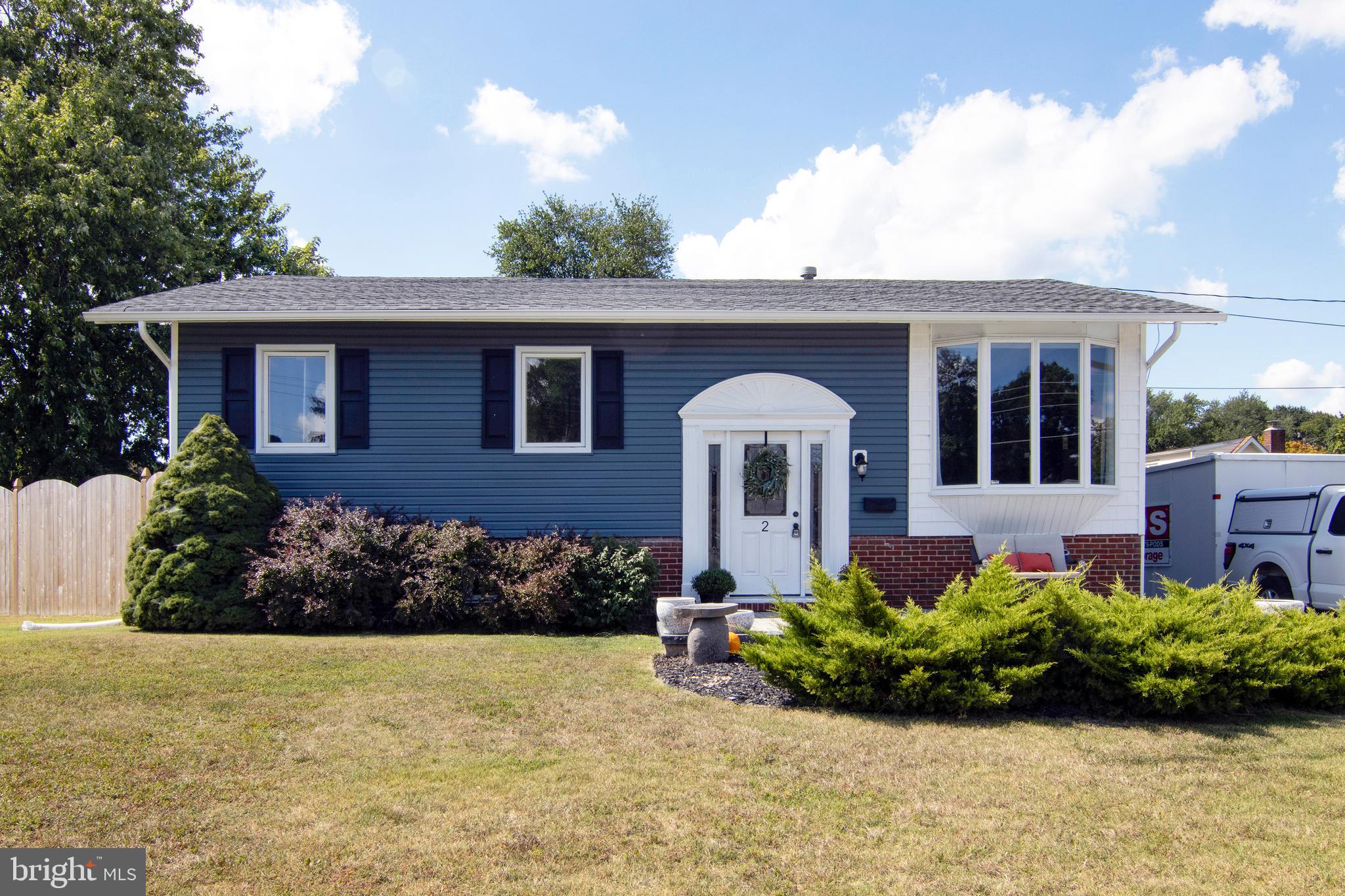 2 Edgehill Road Gibbsboro, NJ 08026 - Photo 1 of 45 a front view of a house with a garden