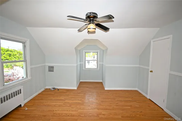 a view of empty room with windows