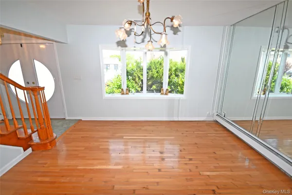 a view of an empty room and window