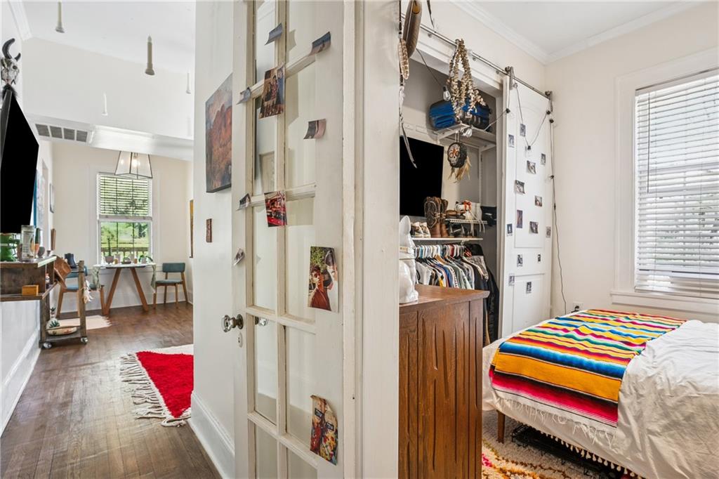737 Barnett Street Northeast, Unit C4 Atlanta, GA 30306 - Photo 13 of 24 a living room with a bed and a couch