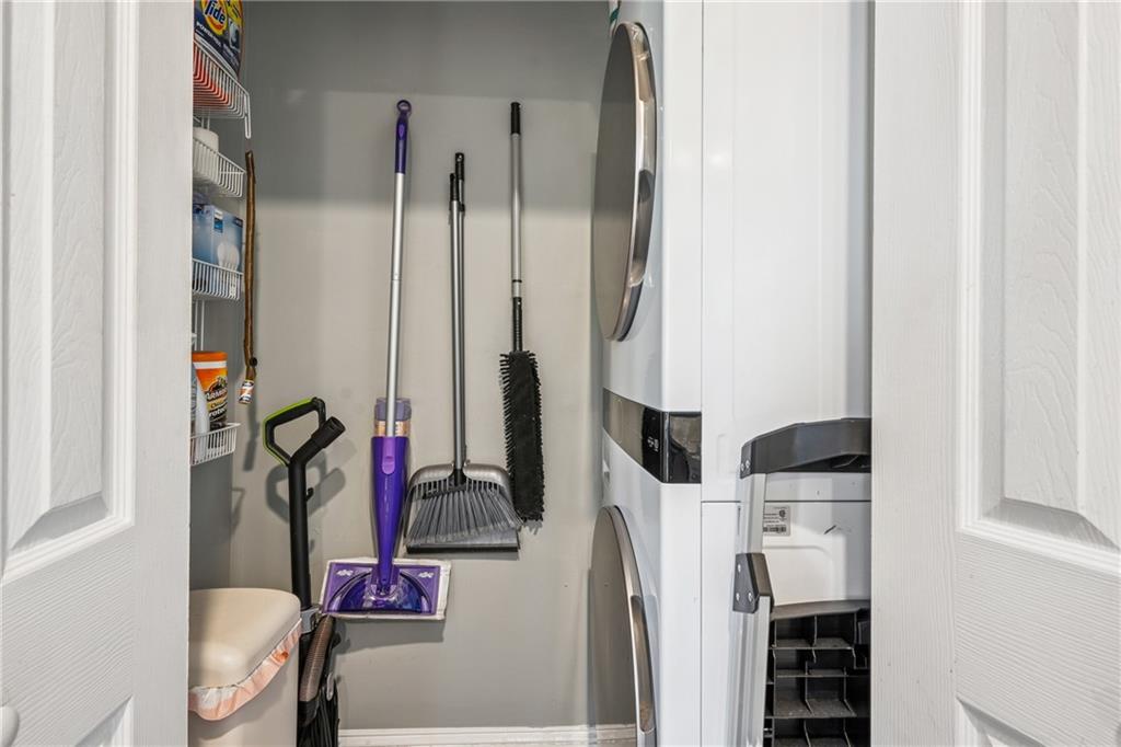 737 Barnett Street Northeast, Unit C4 Atlanta, GA 30306 - Photo 14 of 24 a view of walk in closet with clothes and shoes