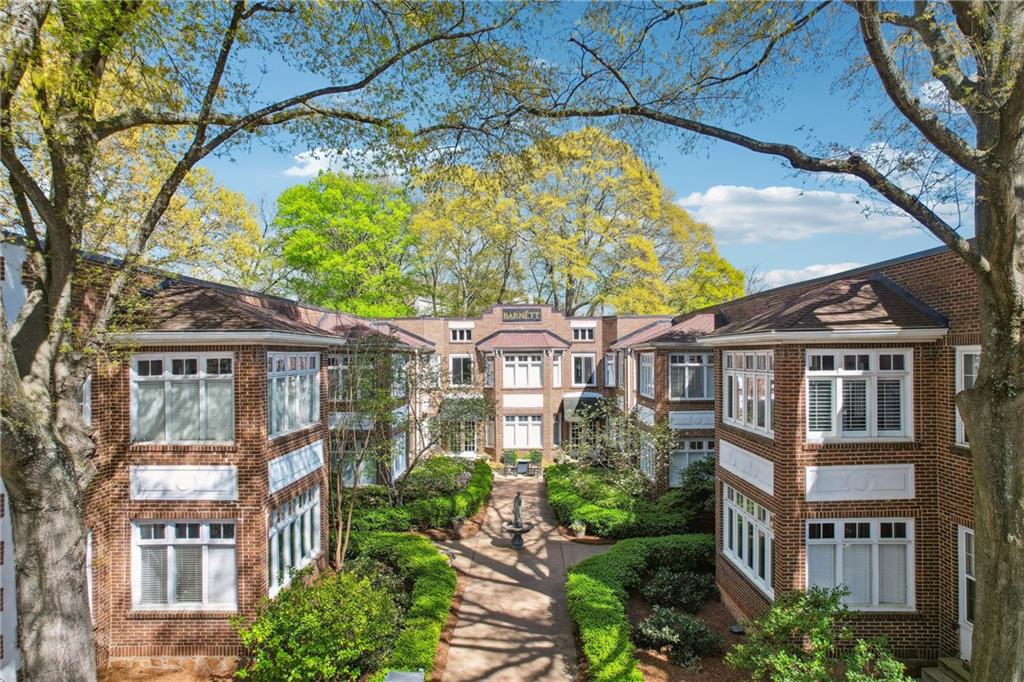 737 Barnett Street Northeast, Unit C4 Atlanta, GA 30306 - Photo 19 of 24 a front view of a residential houses with yard