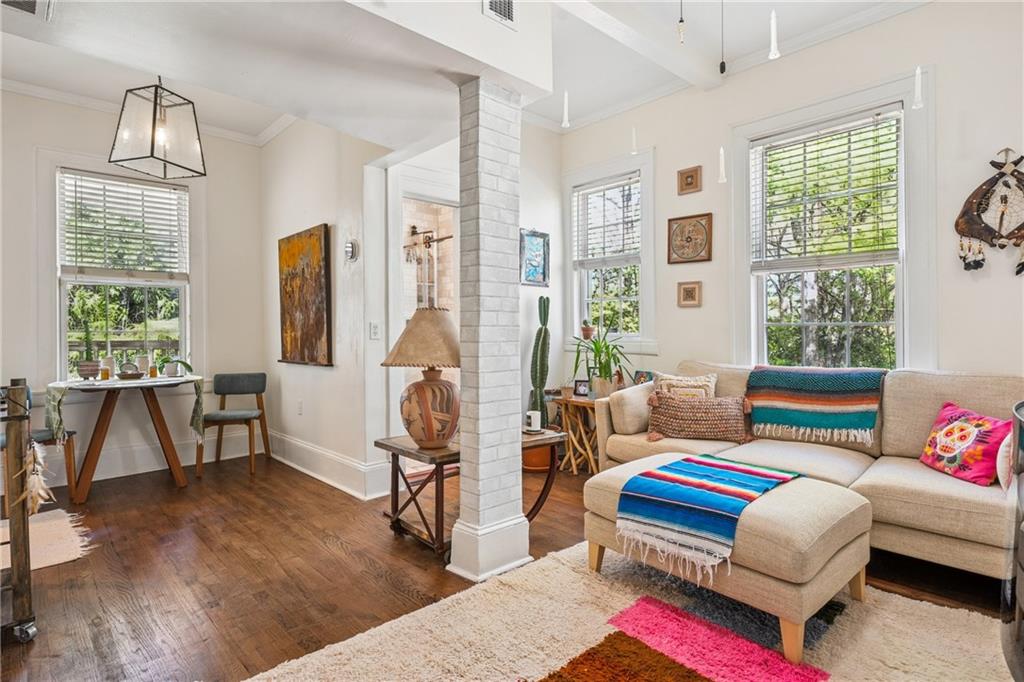 737 Barnett Street Northeast, Unit C4 Atlanta, GA 30306 - Photo 10 of 24 a living room with furniture a rug and a large window