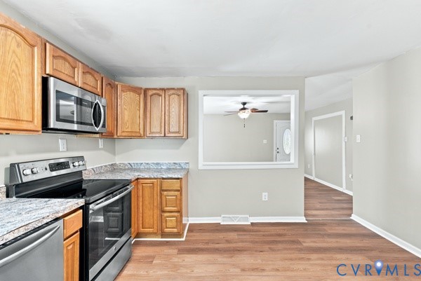 865 Sulphur Spring Road Prospect, VA 23960 - Photo 16 of 40 Kitchen featuring wood-finish flooring, light wood