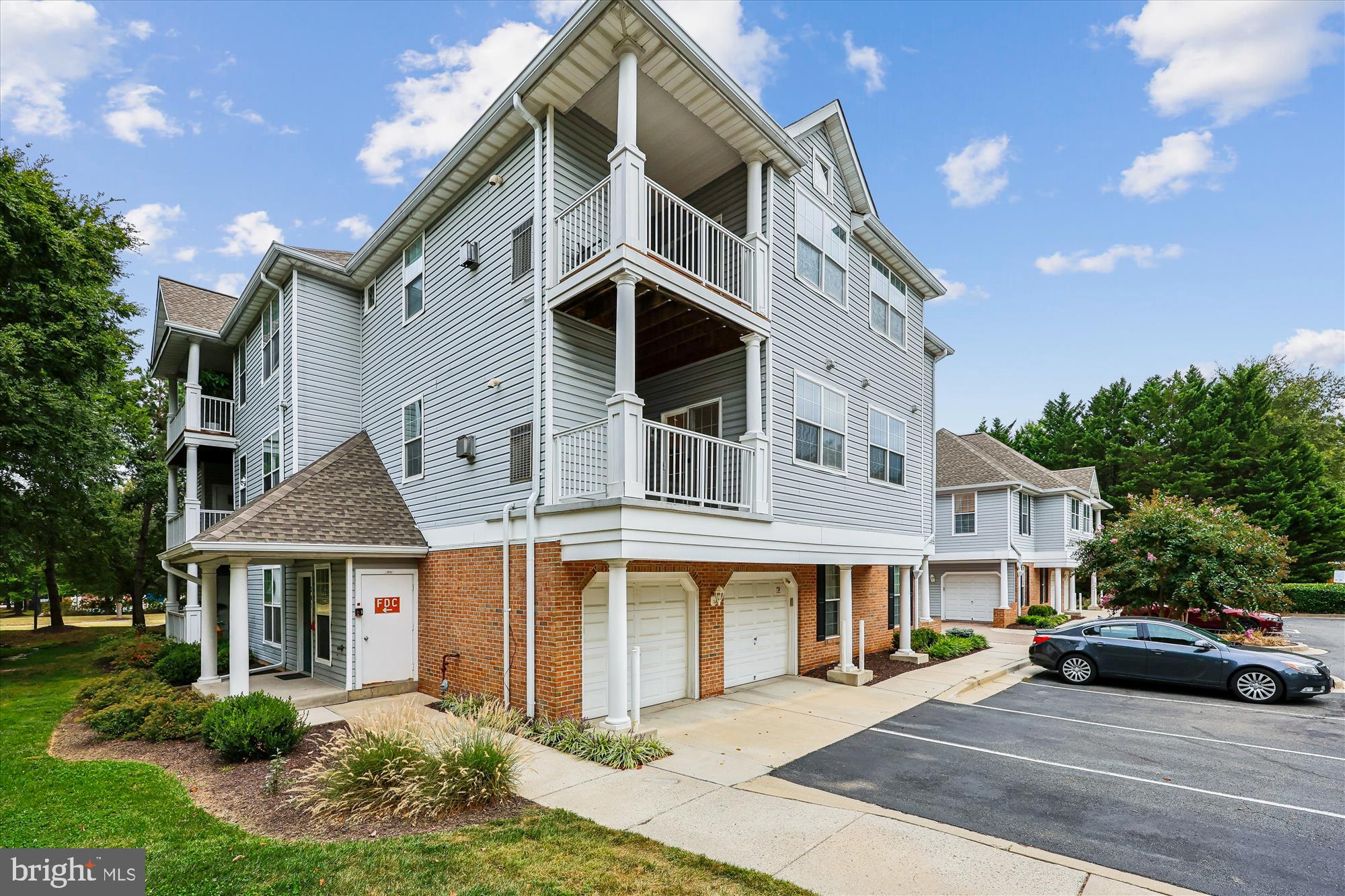 12701 Found Stone Road, Unit 201 Germantown, MD 20876 - Photo 26 of 41 front view of a house with a street