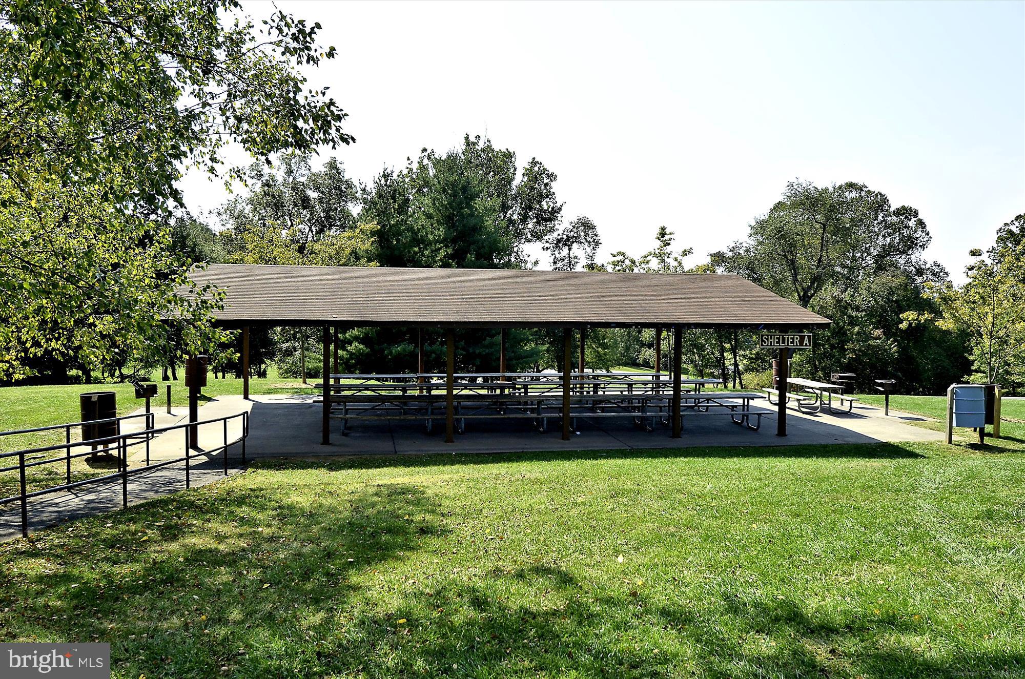 12701 Found Stone Road, Unit 201 Germantown, MD 20876 - Photo 35 of 41 a view of a house with a yard