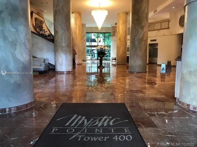 a view of swimming pool with outdoor seating and yard